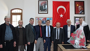 Güneş'ten muhtarlara iadei ziyaret