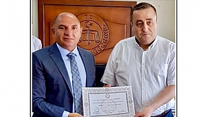 Tarhan mazbatasını aldı