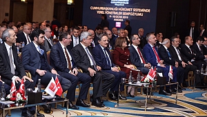 Karaosmanoğlu, sempozyuma katıldı