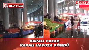Yağmur suyu kapalı pazarda taşkın yarattı