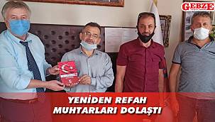 Muhtarlara kitap hediye ettiler