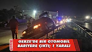 Kontrolden çıkan araç bariyerlerde asılı kaldı