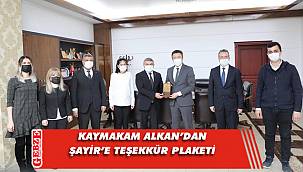 Şayir'e eğitim desteğinden ötürü plaket