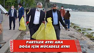 Kaya ve Orhan, mıntıka temizliğini beraber yaptı