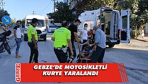 Motosikletli kurye kaldırıma çarparak yaralandı