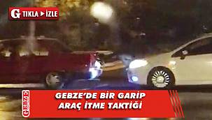 Kaputun üzerine oturup, aracı ayaklarıyla ittiler