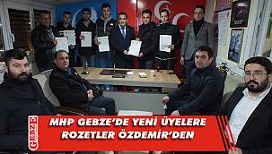 Özdemir, yeni üyelere rozetlerini takdim etti