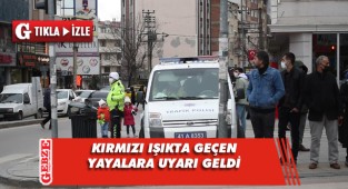 Kırmızı ışıkta geçen yayalara polisten uyarı