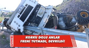 Freni tutmayan çekici, üzerindeki iş makinesiyle birlikte devrildi