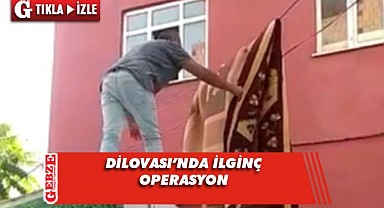 Balkondan düşen halı elektrik teline takıldı