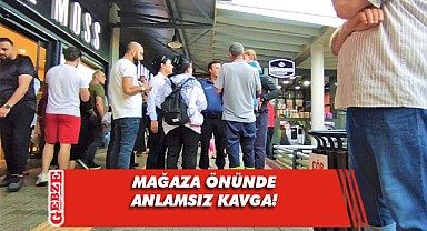 Kadın mağazasının önünde bekleyen eşler, kavga etti!