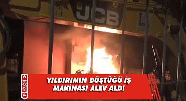 Üzerine yıldırım düşen iş makinası yandı