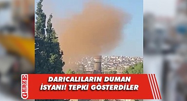 Fabrikanın bacasından çıkan duman isyan ettirdi