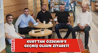 MHP'liler Özdemir'i hastanede ziyaret etti