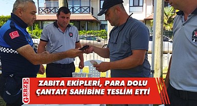 Para dolu çanta sahibine ulaştırıldı