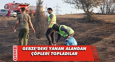 Gönüllüler, yanan ormanlık alandaki çöpleri topladı