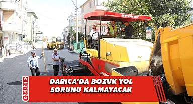 Bıyık, asfalt makinesiyle yolları asfaltladı