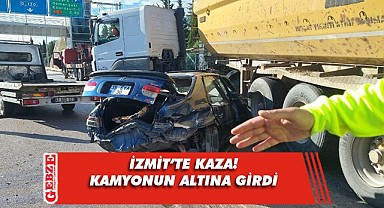 Kamyonun altına giren araç sürüklendi!