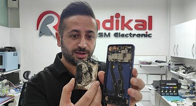 Arızalı cep telefonu alev topuna döndü