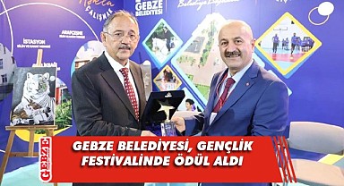 Büyükgöz, ödülü Mehmet Özhaseki'nin elinden aldı