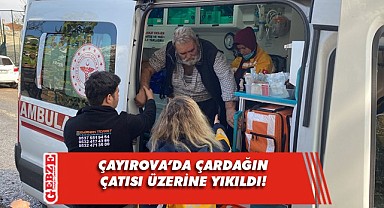 Bahçesindeki çardağın çatısı üzerine devrildi