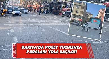 Scooterın koluna taktığı poşet yırtılınca paraları yola saçıldı