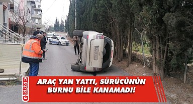 Devrilen otomobilin içinden burnu bile kanamadan çıktı