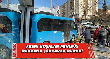 El freni boşalan minibüs, dükkana çarptı