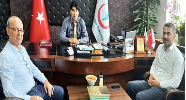 Başhekimden meslektaşına nezaket ziyareti