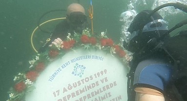 Depremzede dalış rekortmeni, batık şehre dalış yaptı