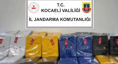 Ünlü markalara ait sahte giyim malzemesi ele geçirildi