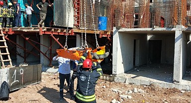 İnşaatta fenalaşan işçi vinç yardımıyla kurtarıldı