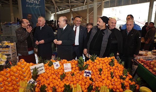 Başkanlar pazarcı esnafın sofrasına konu oldu